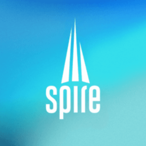 The Spire Network logo featuring three upward-pointing white spires above the word “spire” in lowercase, set against a blue gradient background.
